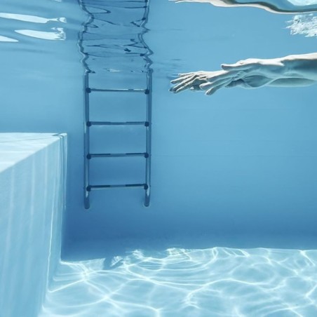 Zwembad NEMO 4.3 x 3 – H.1.31 m met strand, grijs, met beugels vastgeschroefd aan beton