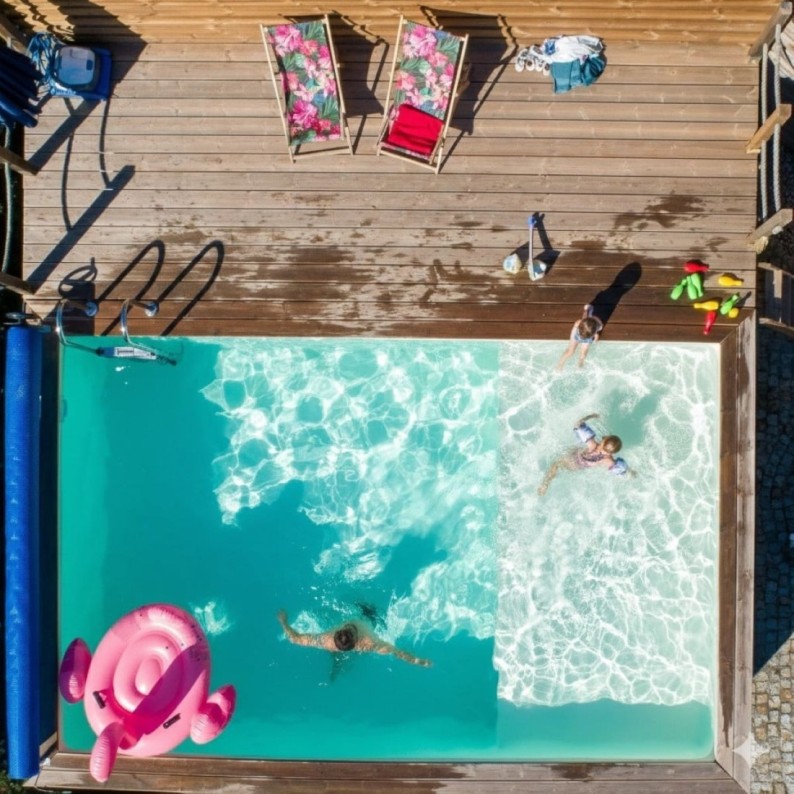 Zwembad AQUA 4.65 x 2.85 – H.1.24 m met strand, zand, met beugels vastgeschroefd aan beton