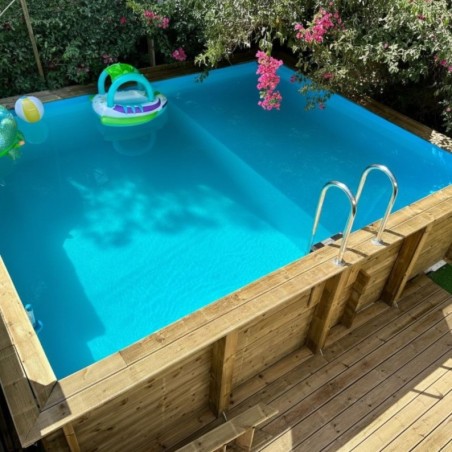 Zwembad AQUA 8.5 x 4.35 – H.1.45 m met strand, lichtblauw, met beugels vastgeschroefd aan beton